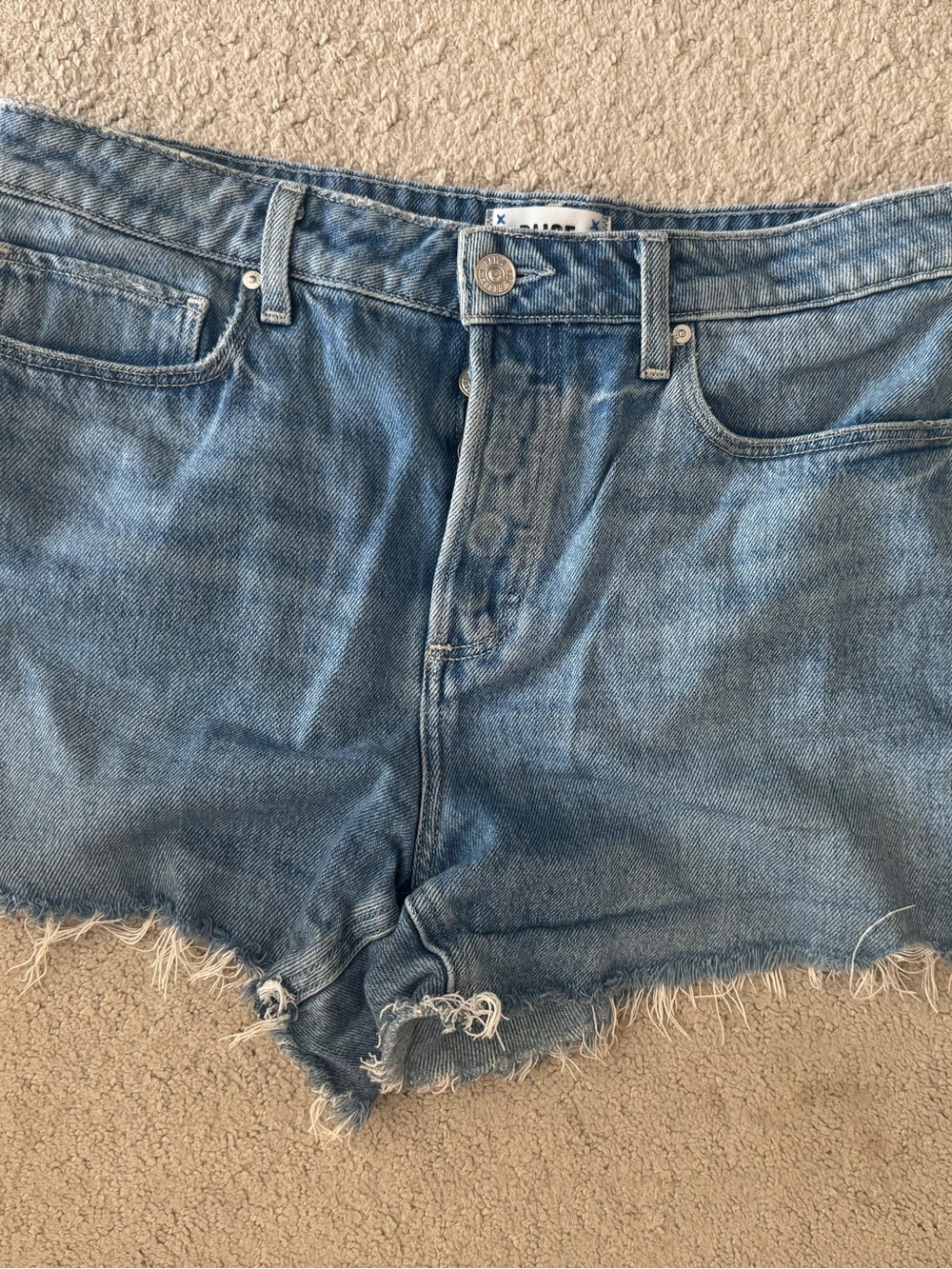 PAIGE Noella Medium Blue Distressed Denim Cutoff Shorts